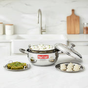 Max Fresh stainless steel multi-tier steam idli cooker with idlis, vegetable cutlets, and momos on plates